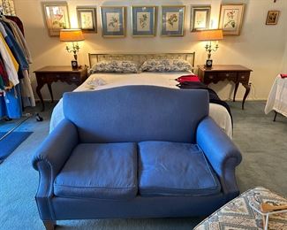 Framed Botanical Prints, Brass Headboard, Bedside Dressing Tables, Brass Lamps, Camelback Settee, vintage clothing. 