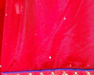 Rhinestones on red with electronic blue accents 