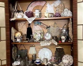 Must see vintage hutch filled with purses and all kinds of unique, charming treasures!