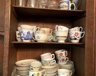 Cupboards full of antique and vintage cups and saucers.