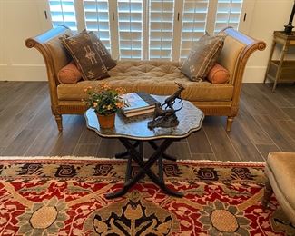 Attractive French style daybed in velvet, folding coffee table, interesting smalls throughout the home.