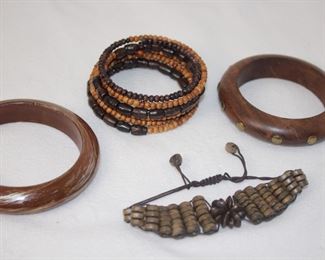 A Seres Of 4 Brown Bangle Bracelets
