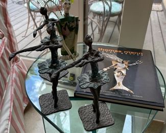 Trio of bronze ballerinas/glass table