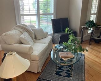 Silk rug, glass coffee table with gold accent, whit loveseat, slipcovered dining chairs set of 4 