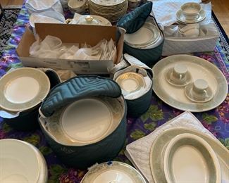 Three complete sets of china, 12 places each. 