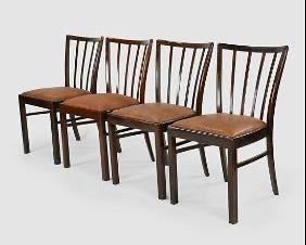 Four Stained Mahogany Mid-Century Modern Spindle-Back Dining Chairs