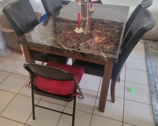 4 Black dining chairs have cat damage