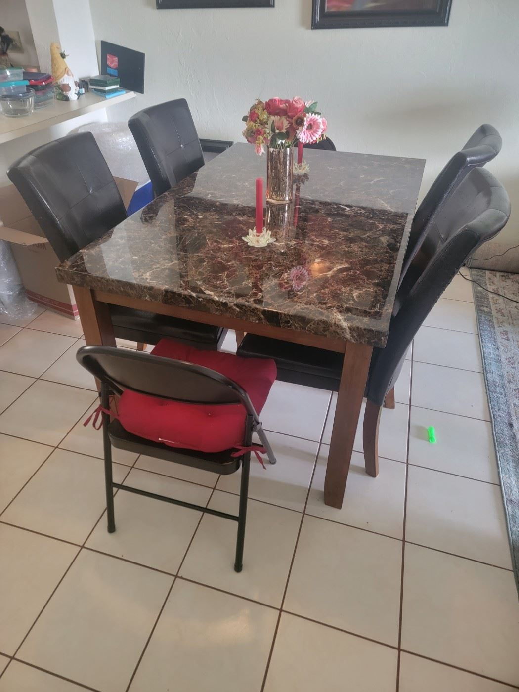 4 Black dining chairs have cat damage