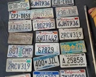 #187 • 24 License Plates and 4 Plate Frames