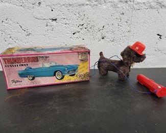 #1014 • 1956 Thunderbird Friction Car and Vintage Remote Control Dog Toy