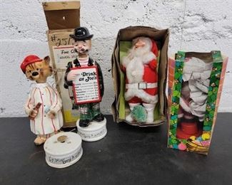 #1016 • Musical Decanter, Musical Dancing Santa, Ceramic Decanter and Santa Figure