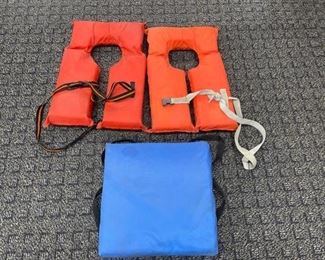#3036 • 2 life vest and one floating device