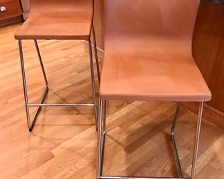 Pair of leather and chrome bar stools