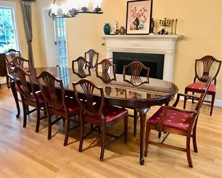 Thomasville dining table with two leaves and 12 dining chairs