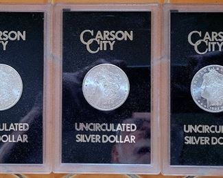5 uncirculated Morgan Carson City silver dollars....1882, 1883 ,1884.