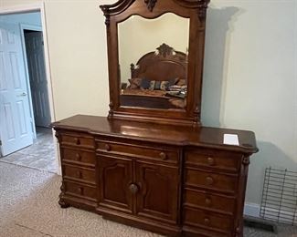 Solid wood dresser with mirror quality design and material. 