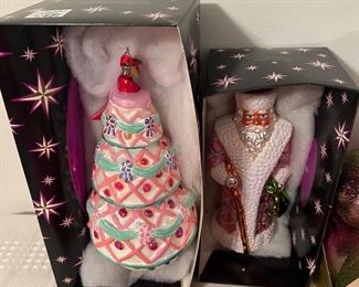 Table full of Christopher Radko Ornaments many new with tags boxes