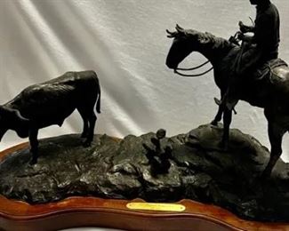 Jim Reno bronze, "Brand Inspector"