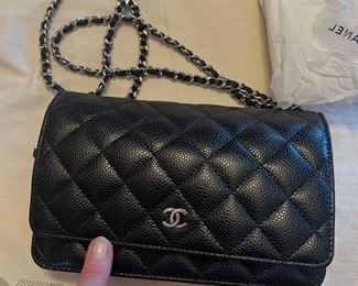 CHANEL

Identification Card + Matching hologram sticker, matching all the specs for a 2018 Chanel sticker and card.  1.  8 digits starting with 25 ~~~ 2. O’s have strikethroughs ~~~ 3.  1’s having small serifs(feet).  4.  2 Chanel logos above the serial.