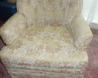 One of 2 vintage tufted chairs