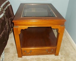One of 2 matching Bassett glass top end tables