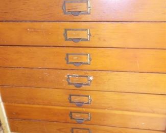 Flat file full of assorted nuts, bolts, screws, nails