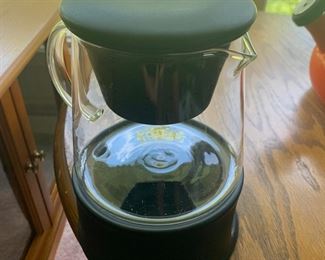 #240 loose tea pot with base to warm with a candle  $10