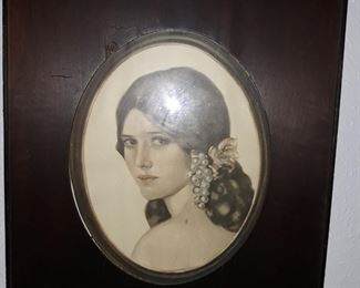 Antique portrait in antique frame