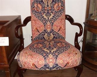 A pair of upholstered arm chairs