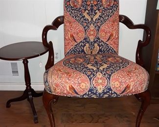 A pair of upholstered arm chairs