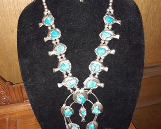 Turquoise and silver squash blossom necklace and earrings