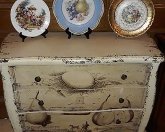 Small painted chest of drawers and vintage plates