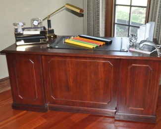 National Office Furniture Company Executive Cherry 7 Drawer Desk, 66"w x 29"d x 29.5"h. Also Available is the Matching Credenza (Not Shown), 72"w x 21.25"d x 29.5"h Complete with 2 Doors for Storage and 4 File Drawers