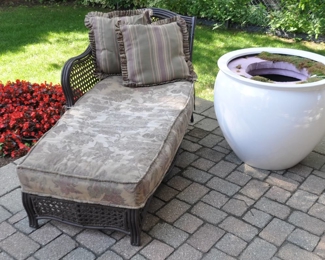 Agio International Company All-Weather Wicker, and Powder-Coated Aluminum Brown Chaise Lounge with Detachable Cushion. Shown with Jumbo White Fiberglass Planter.