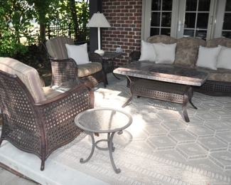 Amazing Collection of Outdoor Patio Furniture by Agio International Company All-Weather Wicker, Powder-Coated Aluminum and Stone Tops. Shown is the Five-Piece Set including Couch, 2 Chairs, Coffee Table and End Table. (Also Shown is a Petite 19" Tempered Glass Brown Jordan End Table)