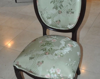 One of the Gorgeous Carved Walnut Dining Chairs Available in the Set of 10. Upholstered in a Celadon Green Floral Design