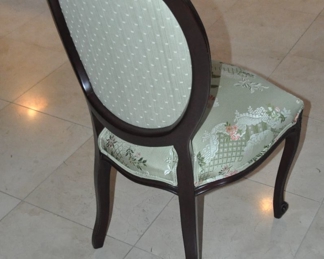 Back View of the Carved Walnut Dining Chairs Upholstered in a Complimentary Fabric 