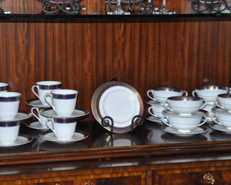 View of the Bread and Butter Plate, The Cups and Saucers and the cream Soup and Saucers included in the Royal Doulton "Rochelle" Set
