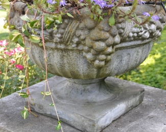 Close Up View of the Footed Limestone Grape Planters