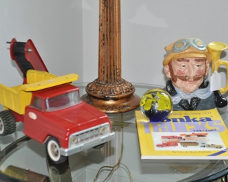Vintage Tonka Dump Truck with sand Loader, Shown with a Royal Doulton Veteran Motorist Large Toby Mug