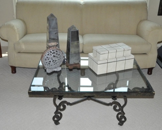 Bronze Wrought Iron and Glass Coffee Table, 40" x 28" x 18"h Shown with a Pair of Ivory Faux Shagreen Decorative Boxes, a Pair of Smokey Silver Obelisk Sculptures and a Carved Decorative Vase