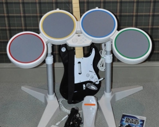 Rock Band for the Nintendo Wii Gaming System Including Drums, Foot Pedal, Guitar and Microphone.
