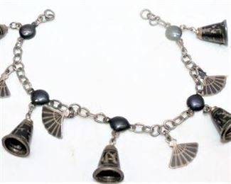 Lot 023   0 Bid(s)
Silver dancing goddess/fan bracelet