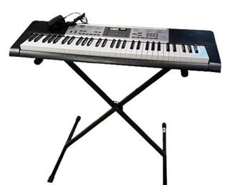 Lot 079   25 Bid(s)
Casio Keyboard with Stand