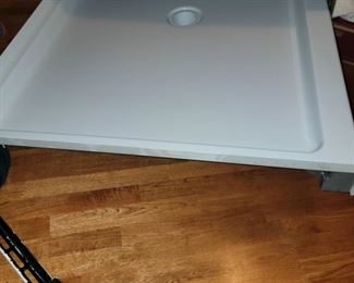 Delta  48"x34" to stud, center drain shower base