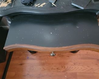 Each nightstand has a pull-out writing surfice