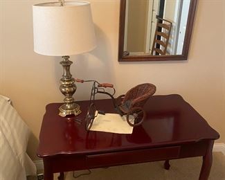 Small secretary desk with keyboard drawer.  Lamp & mirror also for sale. 