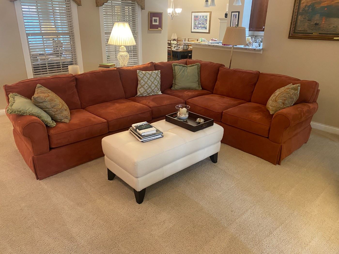 Large sectional, terrific condition, non-smoking, no pets.  Asking $800. Leather (?) ottoman, like new, also for sale. Asking $175.