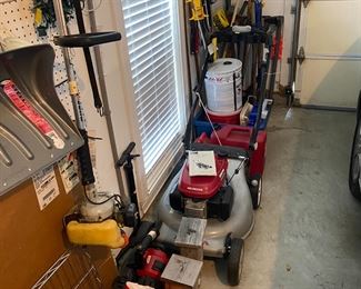 Honda mower, weed-eater, lawn tools.  