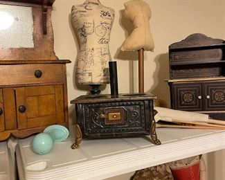 Several antique Doll Stoves